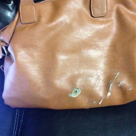 designer handbag repair near me.